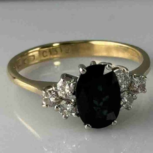 18ct Gold Oval Cut Sapphire & Diamond Cluster Ring