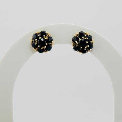 fig 1. A pair of round 9ct yellow gold cluster stud earrings set with dark blue faceted sapphires in multi-claw settings.