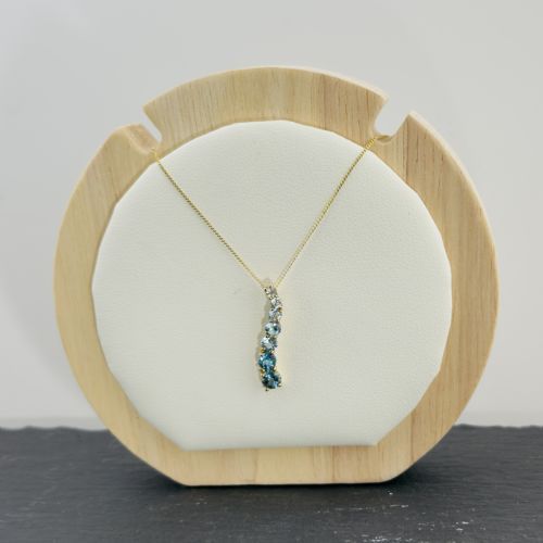 9CT GOLD BLUE TOPAZ WAVE PENDANT NECKLACE