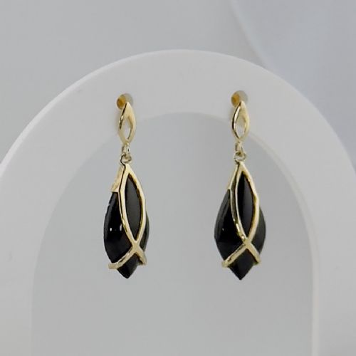 fig 1. A pair of 9ct yellow gold drop earrings featuring teardrop-shaped polished black onyx stones encased in overlapping gold wirework.
