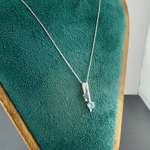 fig 1. 9ct White Gold Blue Topaz and Diamond Cluster Pendant Necklace