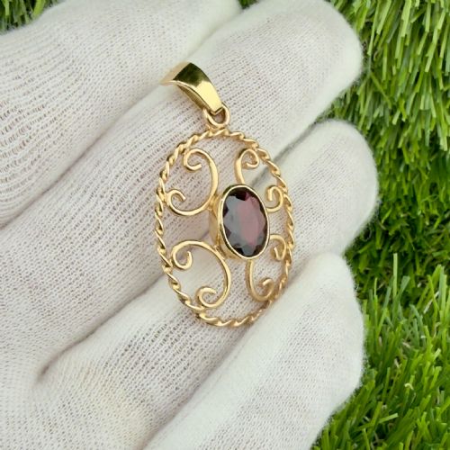 fig 1. 9ct Gold Mid-Century Arts & Crafts Oval Cut Garnet Pendant
