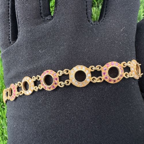 18ct Gold Continental Ruby (1.80ct) and Diamond (1.80ct) Hooped Bracelet.