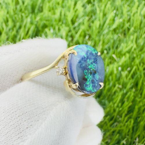 fig 1. 14ct Gold Black Opal Doublet and Diamond Three Stone Ring