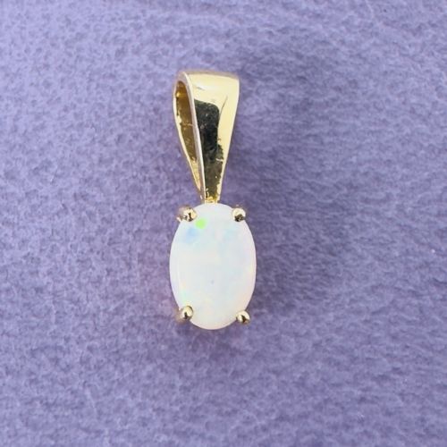 9CT GOLD OVAL CUT OPAL PENDANT - ADDITIONAL PHOTO 1