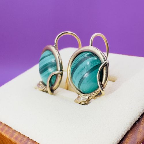 fig 1. A pair of Victorian 15ct gold drop earrings featuring circular banded green malachite cabochons wrapped in a detailed serpent design.