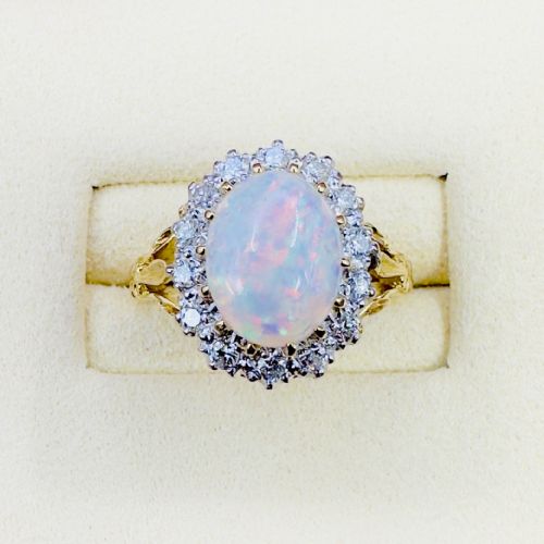 18ct Gold Oval Cut Cabochon Opal and Diamond (0.30ct) Cluster Ring