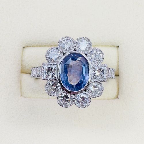 PLATINUM OVAL CUT TANZANITE AND DIAMOND 140CT DIAMOND CLUSTER RING 60G