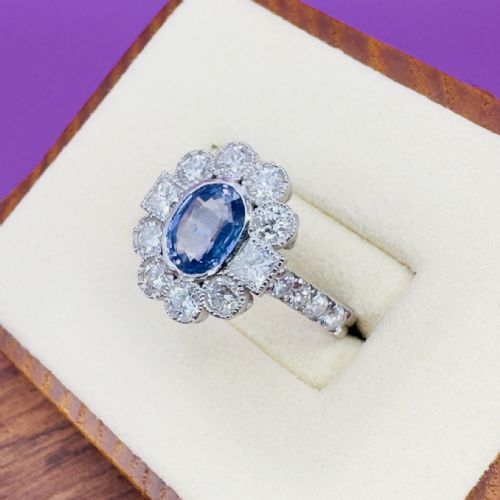 PLATINUM OVAL CUT TANZANITE AND DIAMOND 140CT DIAMOND CLUSTER RING 60G - ADDITIONAL PHOTO 1