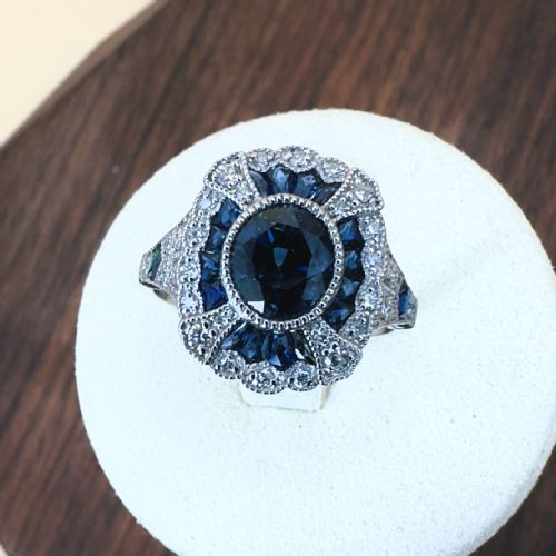 PLATINUM DIAMOND 023CT AND SAPPHIRE 215CT CLUSTER RING