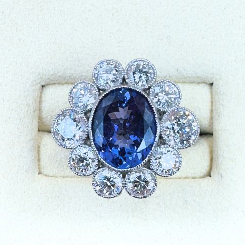 PLATINUM TANZANITE 300CT AND DIAMOND 226CT CLUSTER RING 75G