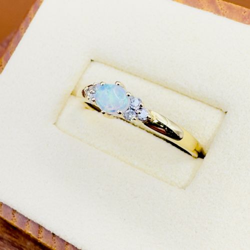 18CT GOLD OVAL CUT EAST TO WEST SET OPAL AND DIAMOND 012CT CLUSTER RING - ADDITIONAL PHOTO 1
