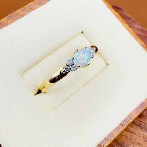 18CT GOLD OVAL CUT EAST TO WEST SET OPAL AND DIAMOND 012CT CLUSTER RING - ADDITIONAL PHOTO 2
