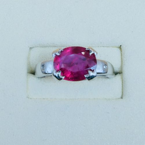 18CT WHITE GOLD OVAL CUT RUBY 300CT AND DIAMOND RING - ADDITIONAL PHOTO 1