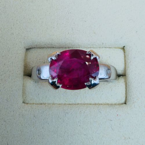18CT WHITE GOLD OVAL CUT RUBY 300CT AND DIAMOND RING - ADDITIONAL PHOTO 4