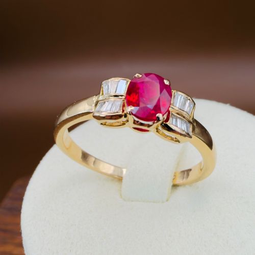 18ct Gold Oval Cut Ruby and Baguette Cut Diamond (0.25ct) Cluster Ring