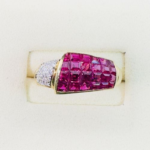fig 1. An 18ct yellow gold dress ring featuring a curved panel of princess cut red rubies alongside diamond set shoulders.