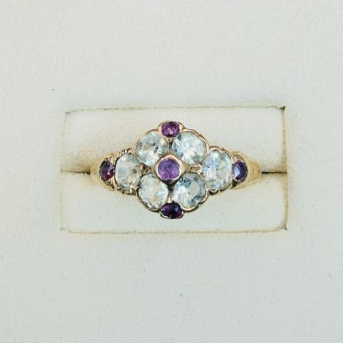 fig 1. An 18ct yellow gold early Victorian cluster ring set with pale green spinels, rubies, and purple almandine garnets.