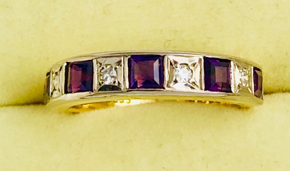A 18ct Yellow Gold Amethyst and Diamond Half Eternity Ring size K
