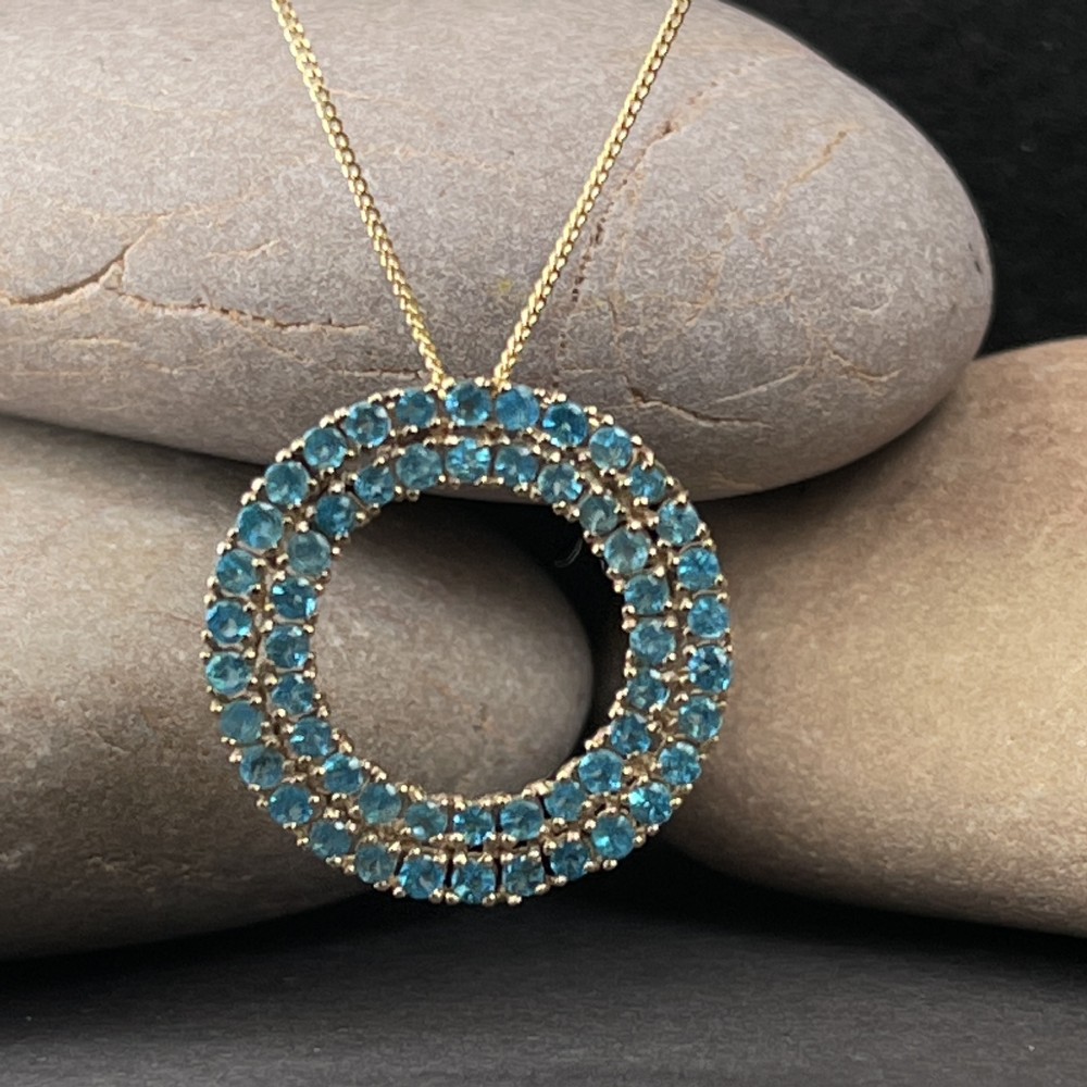 9ct Gold Blue Topaz (2.70ct) Circular Pendant Necklace