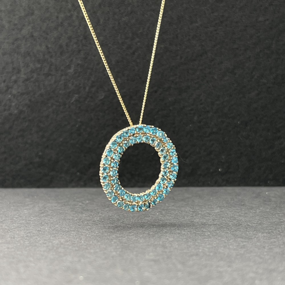 9ct Gold Blue Topaz (2.70ct) Circular Pendant Necklace View III