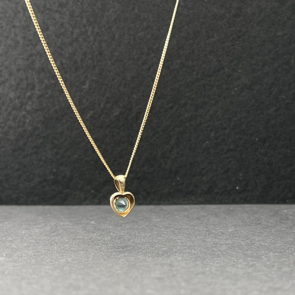 9ct Gold Blue Topaz Heart Pendant Necklace View IV