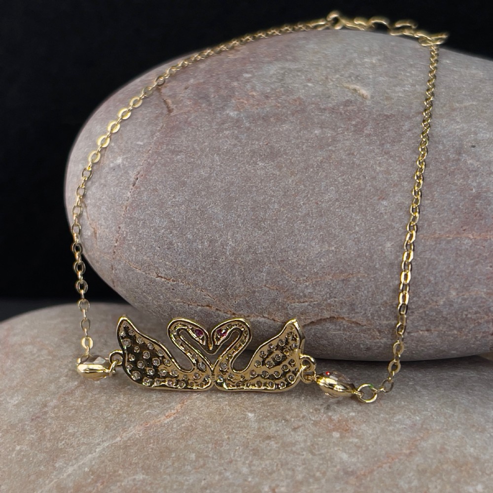 18ct Gold Pink Sapphire Swan Bracelet View III