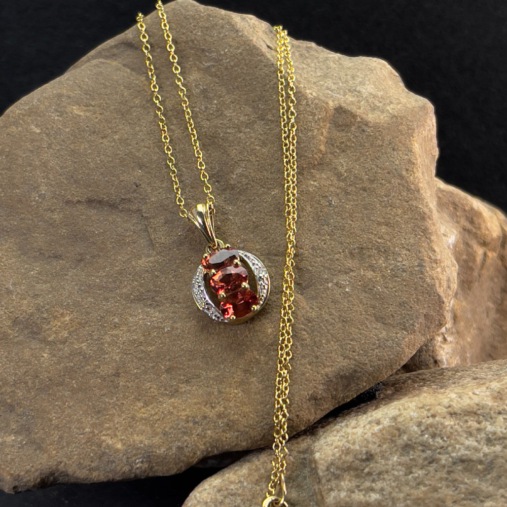 9ct Gold Diamond & Sunset Garnet Pendant Necklace
 View VI
