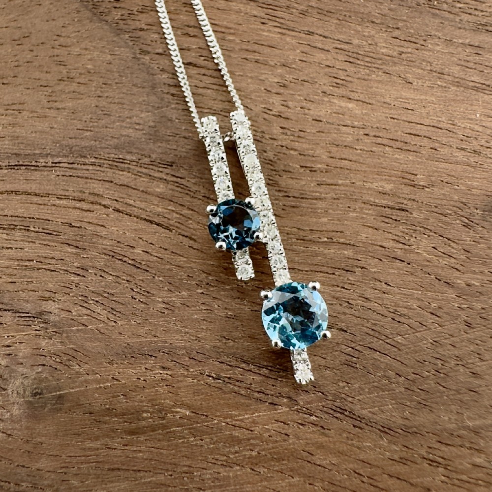 9ct White Gold Blue Topaz and Diamond Cluster Pendant Necklace