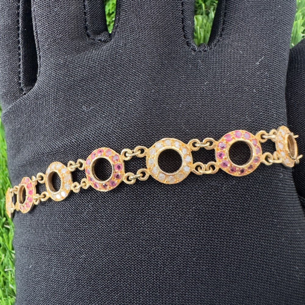 18ct Gold Continental Ruby (1.80ct) and Diamond (1.80ct) Hooped Bracelet.