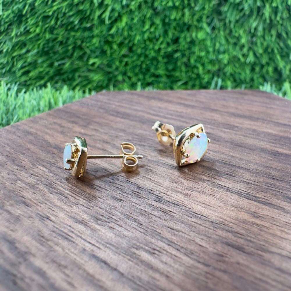 18ct Gold Oval Cut Opal Stud Earrings View III