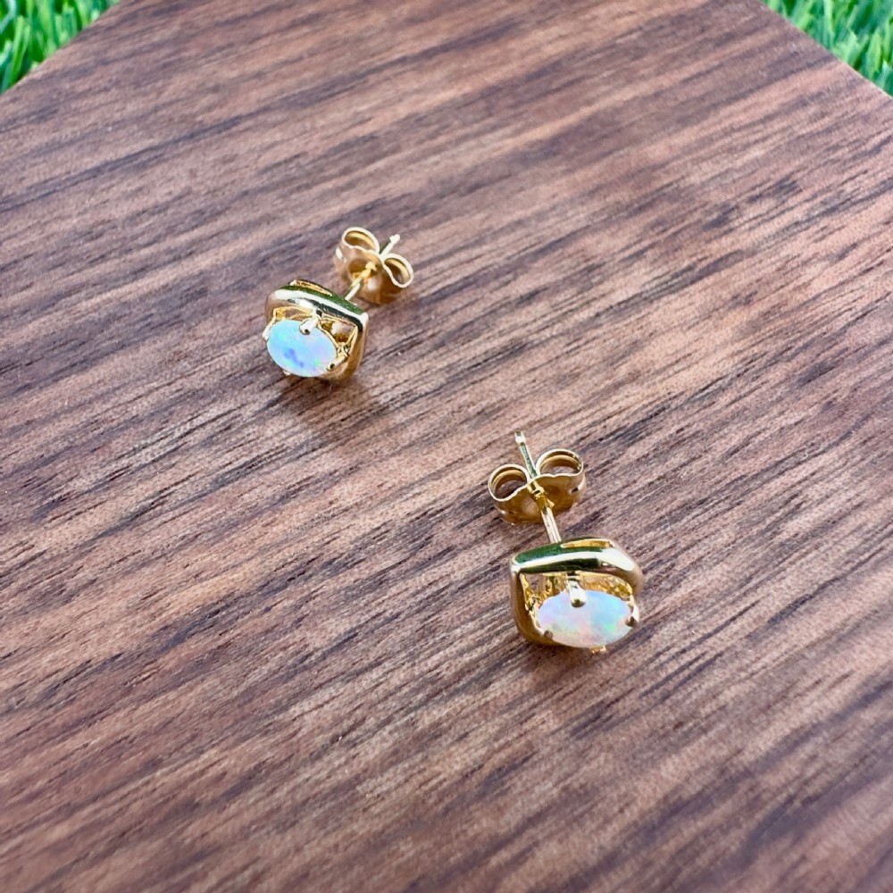 18ct Gold Oval Cut Opal Stud Earrings View X