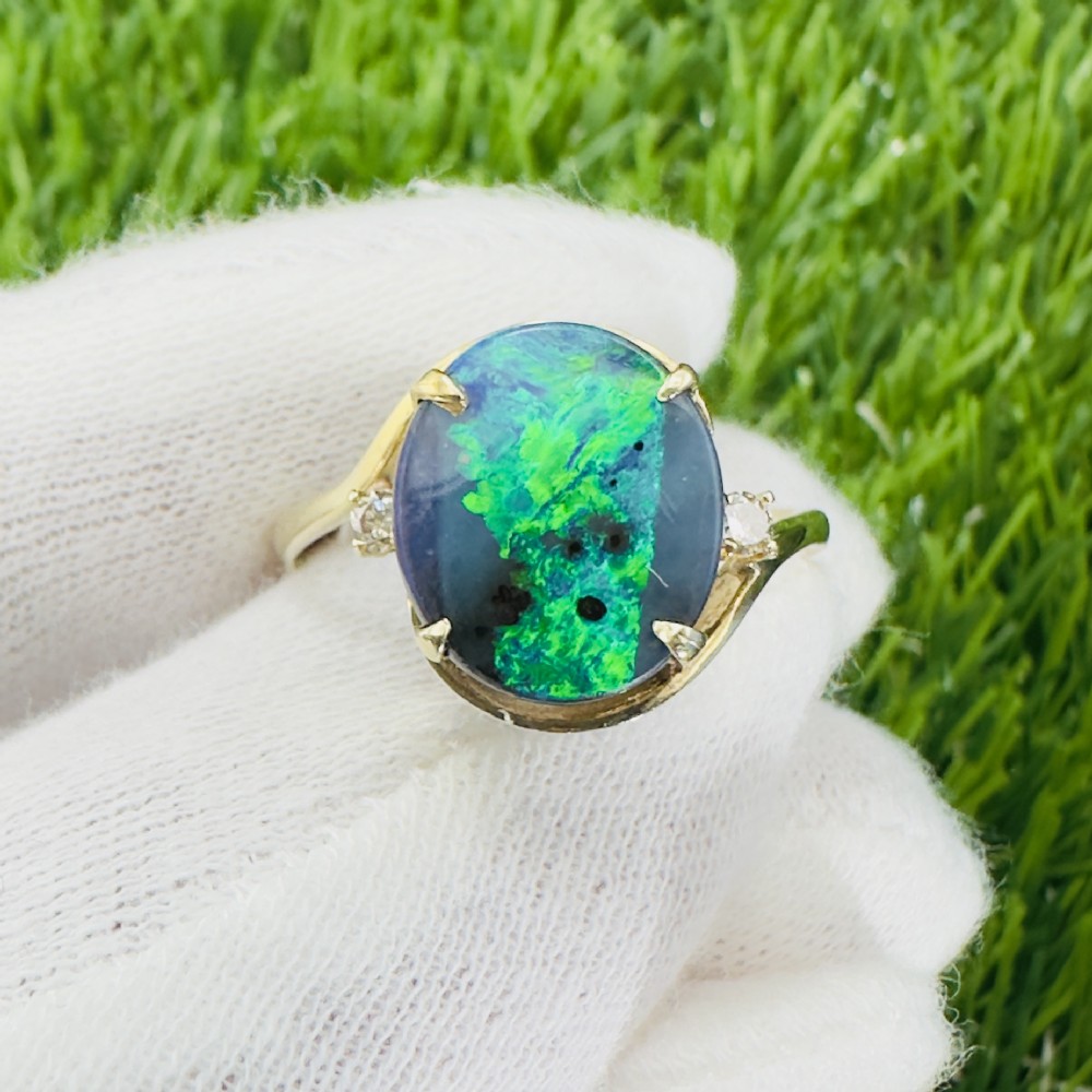 14ct Gold Black Opal Doublet and Diamond Three Stone Ring