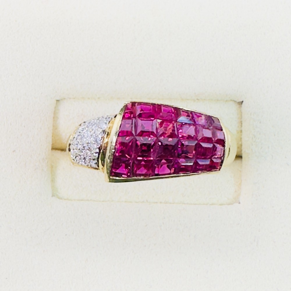 An 18ct yellow gold dress ring featuring a square panel of princess-cut red rubies alongside a curved band of pave-set diamonds.