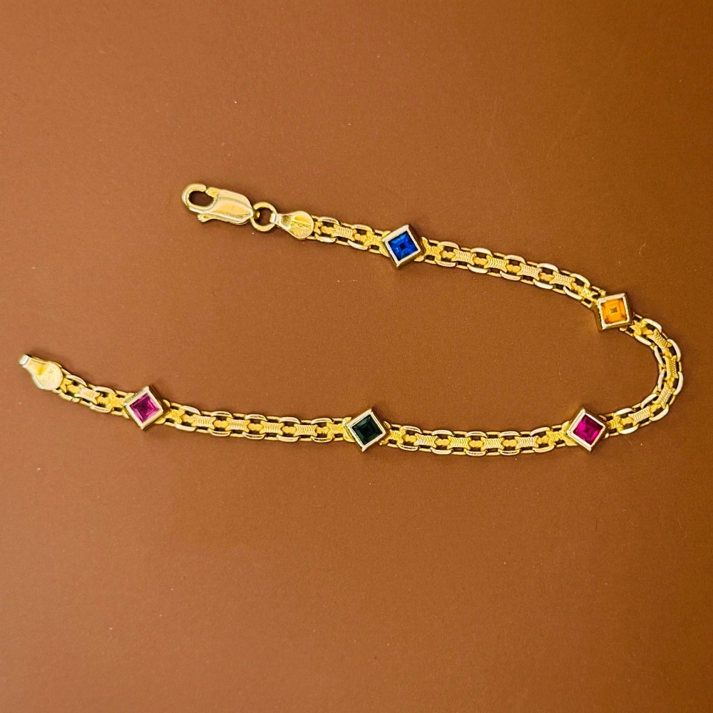 A 14ct yellow gold textured link bracelet featuring five square princess-cut multi-coloured gemstones. View X