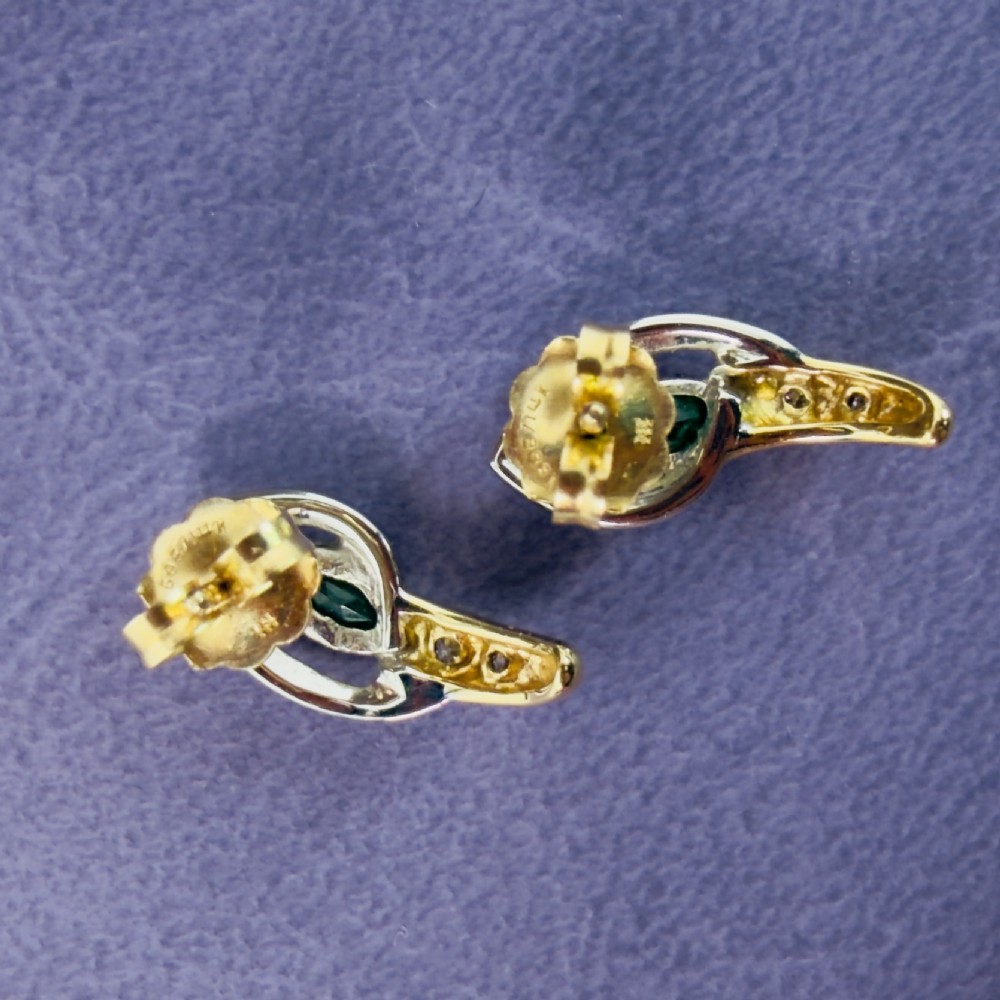 A pair of two-tone 14ct gold stud earrings set with marquise-cut green emeralds and small round diamonds. View XIII