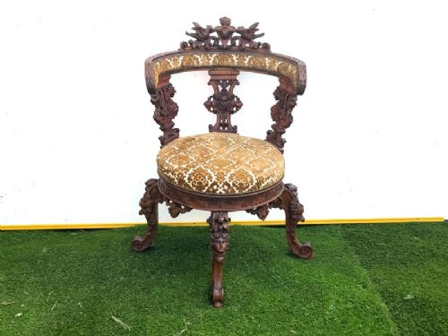 Italian Noble Mans carved walnut audience armchair.