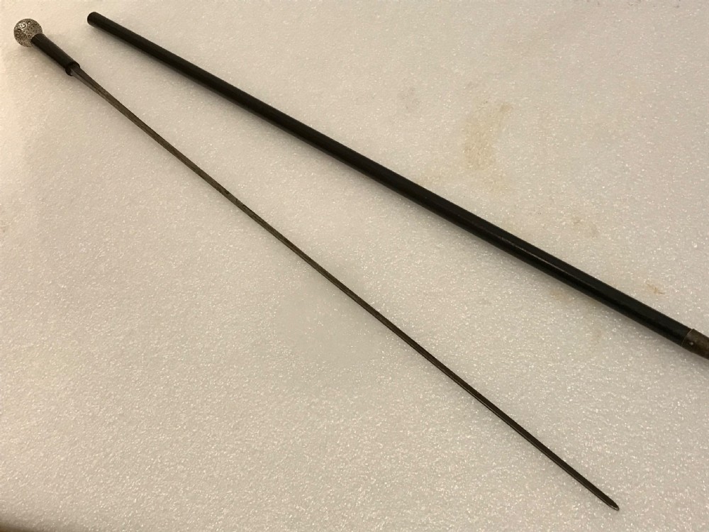 Gentleman’s walking stick sword stick ebony & Silver top hallmarked for Birmingham 1918 View X