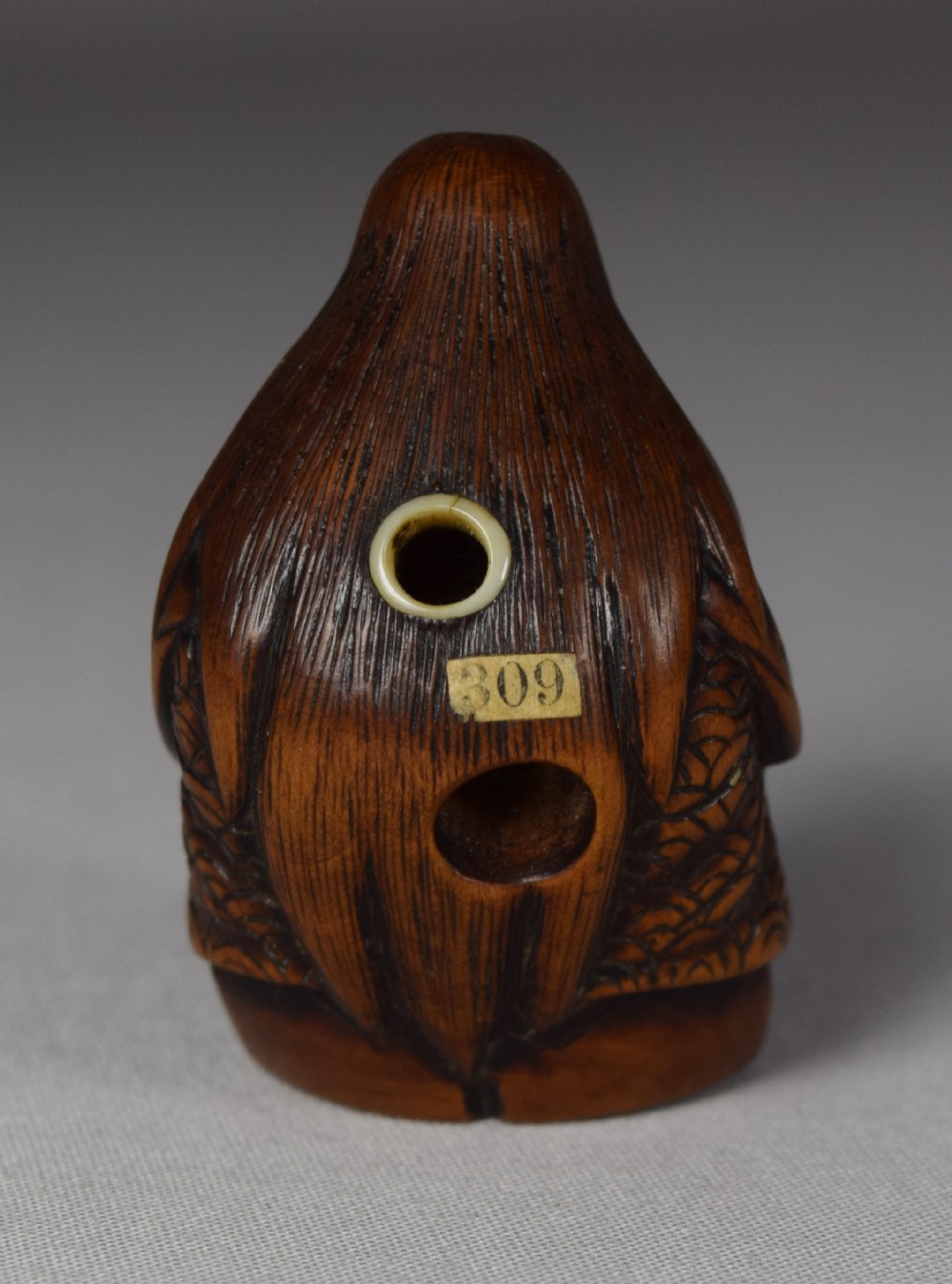 EDO PERIOD JAPANESE WOOD NETSUKE OF SHOJO (OLD LADY) View II