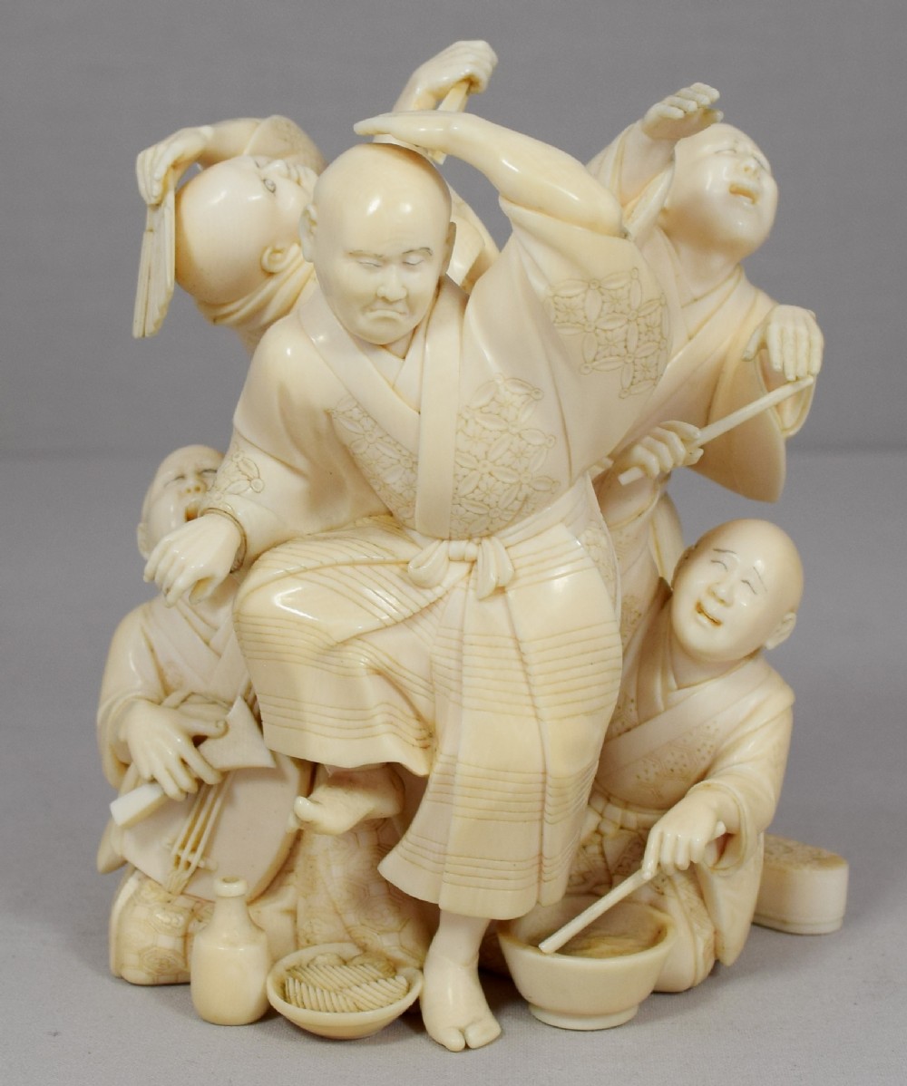 A WONDERFUL QUALITY JAPANESE IVORY OKIMONO MERRY DANCING GROUP View IX