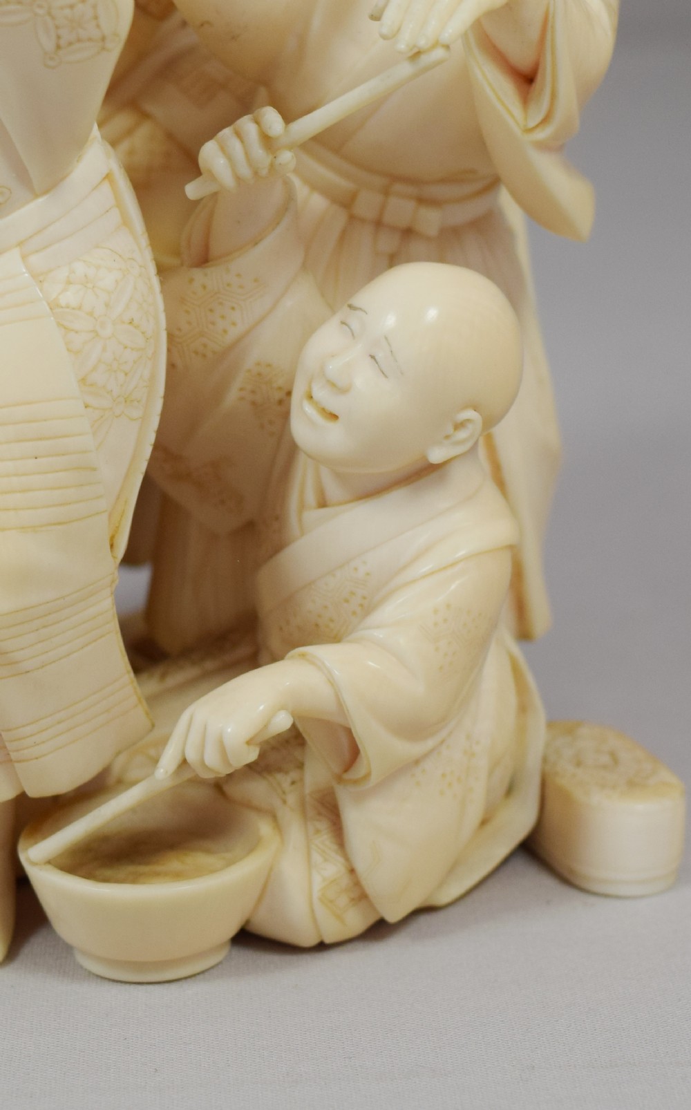 A WONDERFUL QUALITY JAPANESE IVORY OKIMONO MERRY DANCING GROUP View X