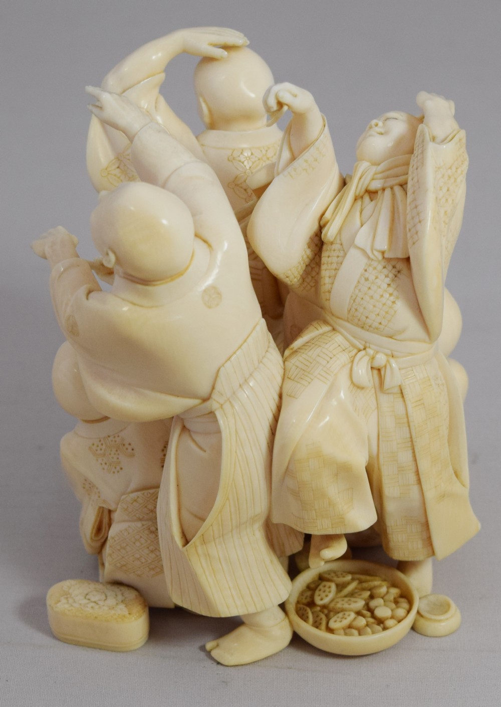 A WONDERFUL QUALITY JAPANESE IVORY OKIMONO MERRY DANCING GROUP View XIV