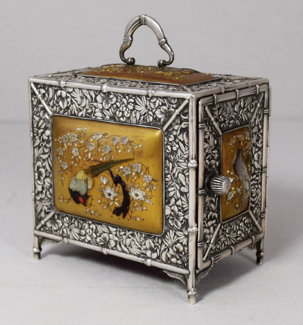 A FABULOUS MINIATURE JAPANESE SILVER SHIBAYAMA KODANSU View II