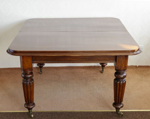 early 19th century solid mahogany dining table with two original extra leaves - CATEGORY: ANTIQUE TABLES - DATED 19TH CENTURY