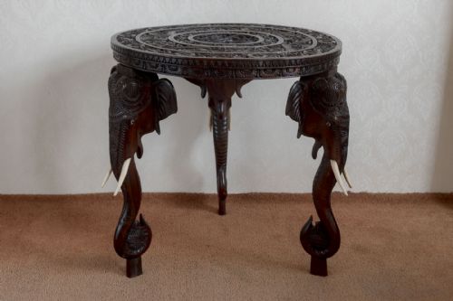 a wonderfully carved hardwood table - CATEGORY: ANTIQUE TABLES - DATED 1910