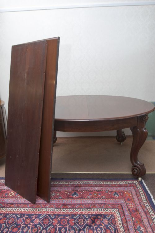 MAGINIFICENT SOLID MAHOGANY EXTENDING DINING TABLE - ADDITIONAL PHOTO 7