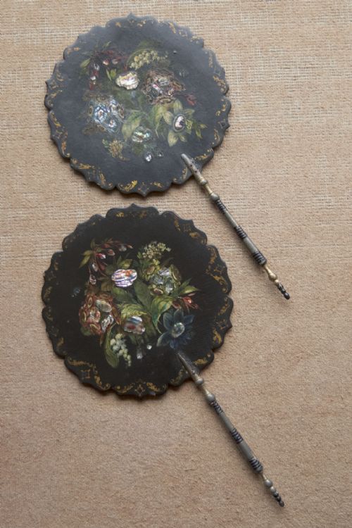 a pair of delightful round 19th century papiermch face screens - CATEGORY: ANTIQUE MISCELLANEOUS - DATED 19TH CENTURY