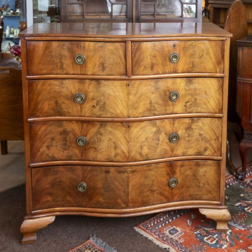 dressing chest of serpentine form - CATEGORY: ANTIQUE CHEST OF DRAWERS - DATED 19TH CENTURY