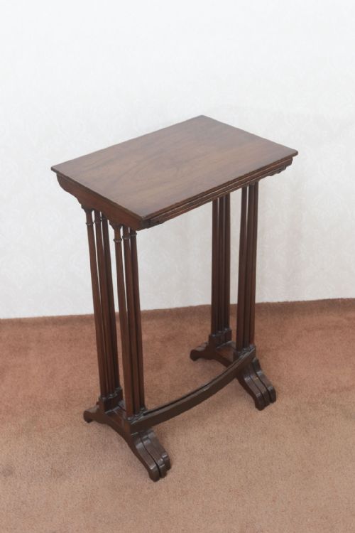 A TRIO OF NESTING TABLES IN MAHOGANY - ADDITIONAL PHOTO 3
