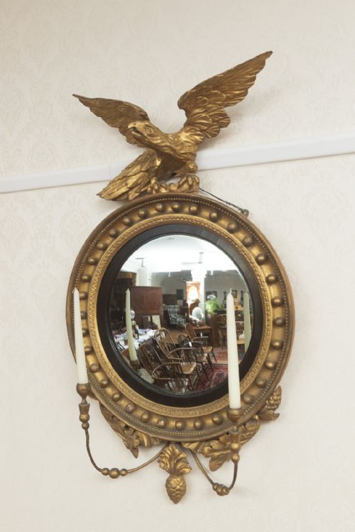 a regency period convex mirror still with the original glass - CATEGORY: ANTIQUE MIRRORS - DATED 19TH CENTURY